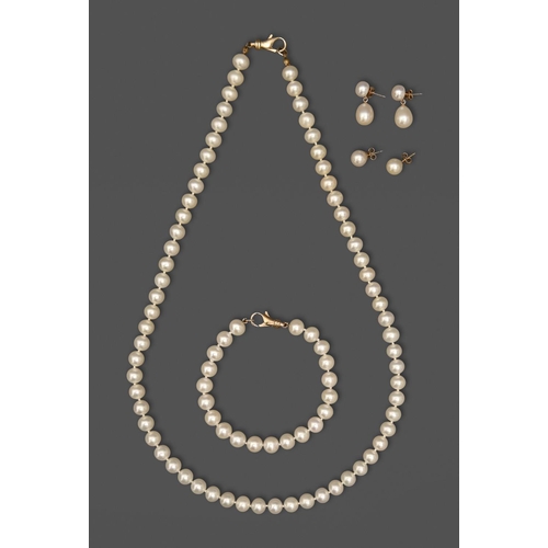 143 - A cultured pearl bracelet and necklace, of approx 8mm cultured pearls, each with gold clasp  ma... 