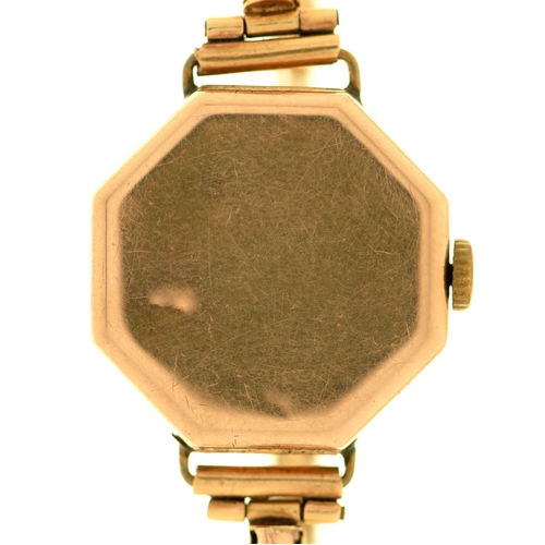 16 - A 9ct gold octagonal lady's wristwatch, wire lugs, 21 x 21mm, on expanding gold bracelet marked 9c, ... 