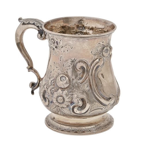 162 - A Victorian silver baluster mug, chased with flowers and foliage, 12cm h, maker’s mark rubbed,... 