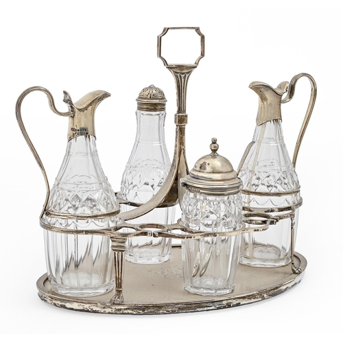 241 - A George III silver cruet frame, engraved with contemporary armorials and a set of four cut glass co... 