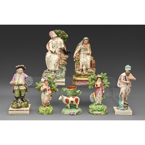 286 - Five Staffordshire earthenware figures, a group and a spill vase, c1815-1830, to include a figure of... 