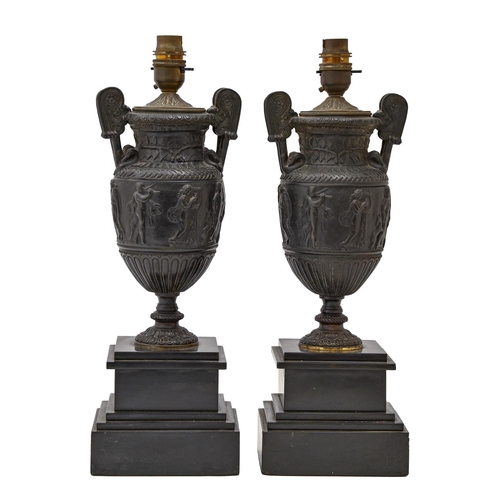 527 - A pair of French bronzed spelter table lamps, early 20th c, after the Townley Vase, on belge noir ba... 