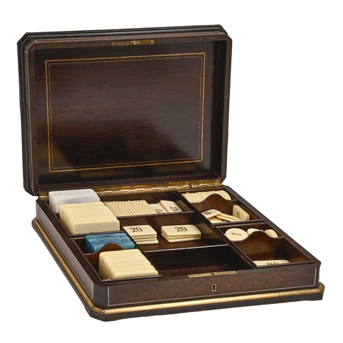 571 - A French brass mounted and ivory inlaid rosewood game box, 19th c, with four removeable trays and la... 