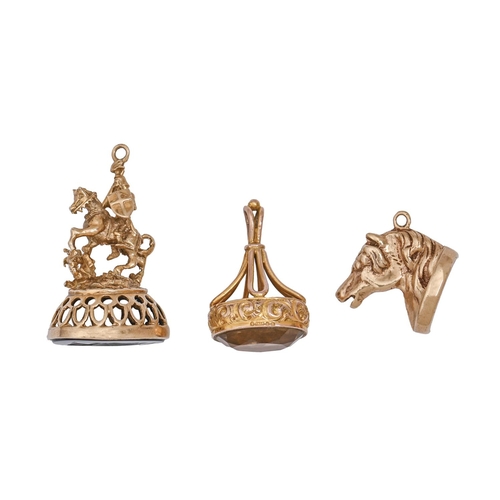 93 - Three 9ct gold fob seals, 20th c, each with cornelian or other intaglio, one engraved with St George... 