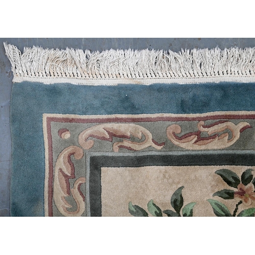 938 - A Chinese silk carpet, 369 x 567cm