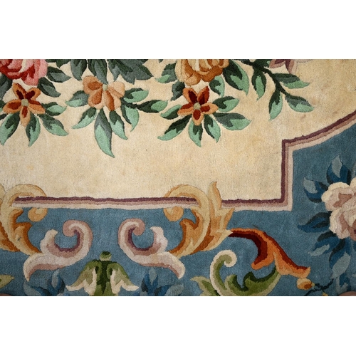 938 - A Chinese silk carpet, 369 x 567cm