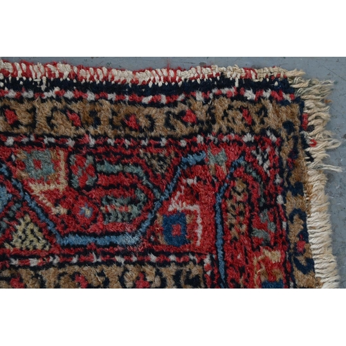 940 - A Middle Eastern rug, 133 x 115cm and another, smaller, 123 x 79cm