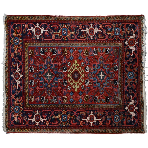 940 - A Middle Eastern rug, 133 x 115cm and another, smaller, 123 x 79cm