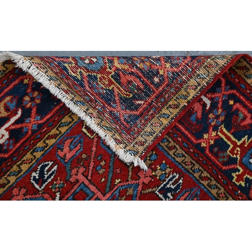 940 - A Middle Eastern rug, 133 x 115cm and another, smaller, 123 x 79cm