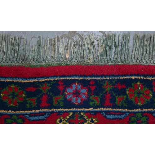 941 - A Middle Eastern wool rug, 182 x 89cm and an Indian needlework rug, 215 x 152cm