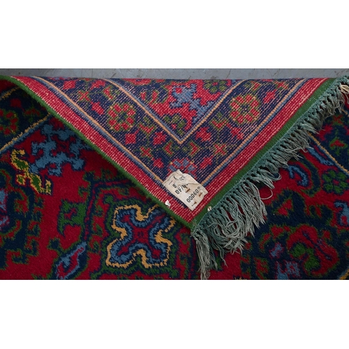 941 - A Middle Eastern wool rug, 182 x 89cm and an Indian needlework rug, 215 x 152cm