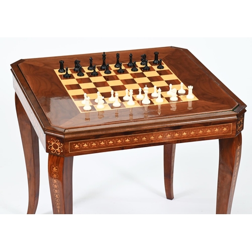 975 - An Italian walnut and inlaid games table, with detachable top, late 20th c, 74cm h; 80 x 80cm... 