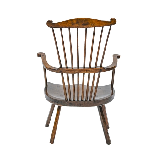 982 - An unusual British ash and fruitwood comb-back Windsor chair, first half 19th c, with substantial sh... 