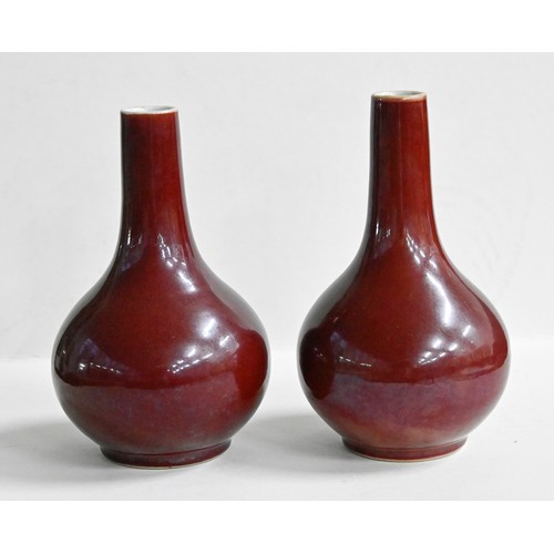 392 - A pair of Chinese porcelain flambé vases, 20th c, 19cm h (2)