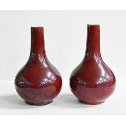 392 - A pair of Chinese porcelain flambé vases, 20th c, 19cm h (2)