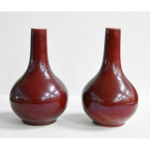 392 - A pair of Chinese porcelain flambé vases, 20th c, 19cm h (2)