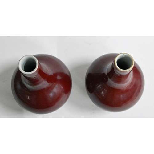 392 - A pair of Chinese porcelain flambé vases, 20th c, 19cm h (2)