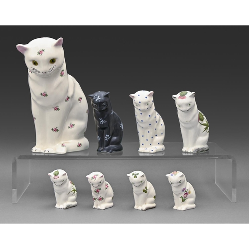 619 - Eight Bovey Pottery cats for Plichta, c1946-56, painted or transfer printed, 27.5cm h and smaller, p... 