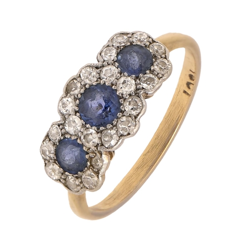 253 - A sapphire and diamond triple cluster ring, gold hoop marked 18ct, 2.3g, size J