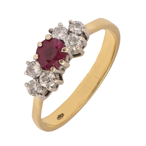 267 - A ruby and diamond ring, in gold, marked 750, 4.g, size N