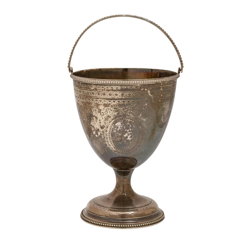 410 - A George III silver sugar basket, of vase shape with beaded rim and swing handle, engraved to either... 