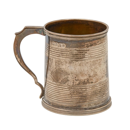 422 - A William IV silver christening mug, cylindrical with reeded bands and rim, on milled foot, 74mm h, ... 