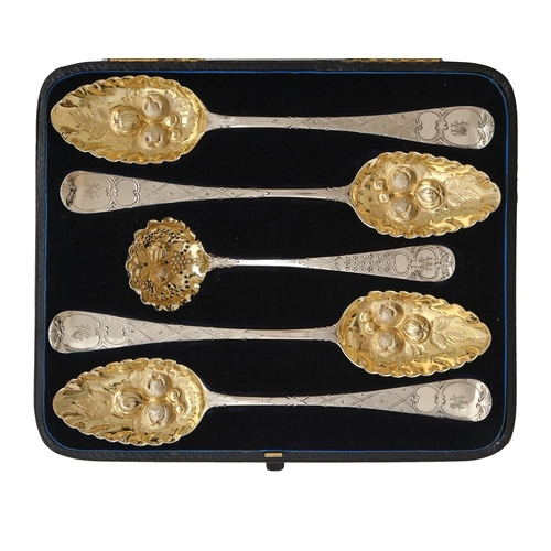 454 - A set of four George III silver tablespoons and a George II silver sauce ladle, later chased and gil... 