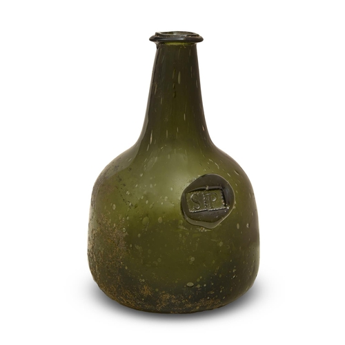 533 - A rare sealed 'mallet' wine bottle, c1730-35, of dark green glass, the neck with applied string rim,... 