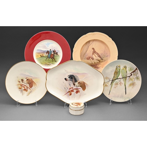 557 - Three Minton plates, a box and cover and a dish, c1920, painted by J E Dean, each signed, with dogs ... 