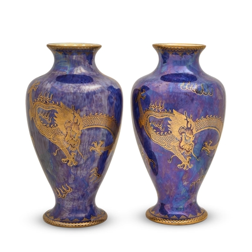 579 - A pair of Wedgwood Dragon lustre vases, designed by Daisy Makeig-Jones, c1920, in the Celestial... 