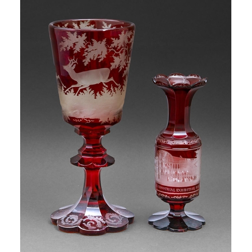 582 - A Bohemian ruby flashed glass goblet, mid 19th c, engraved with stags and a ruby flashed glass vase ... 