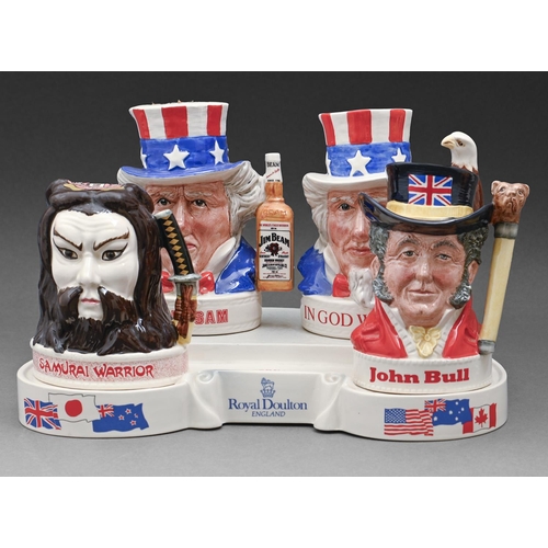 604 - Four Royal Doulton International Collection character jugs and stand, stand 29cm w, printed mark... 