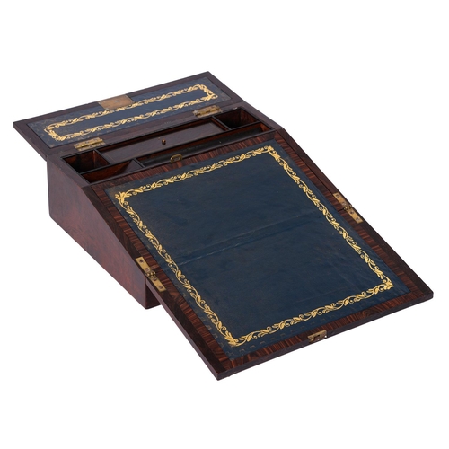 664 - A George IV rosewood writing box or lap desk, c 1825, the crossbanded top with hinged cover and fall... 