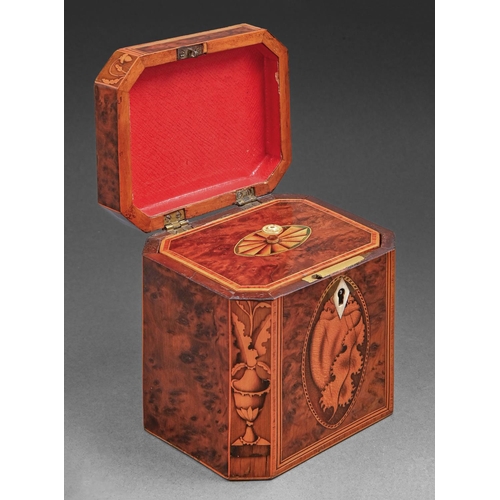 696 - A George III burr yew and inlaid tea caddy, the lid and front with shell paterae flanked by urns wit... 