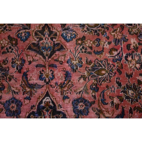 928 - A Persian carpet, 285 x 192cm