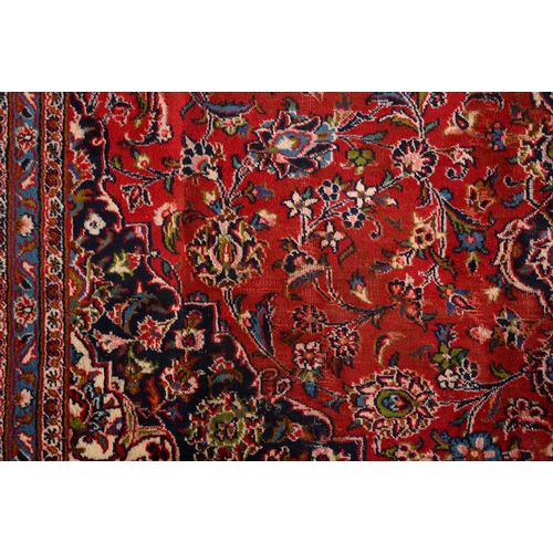 929 - A Persian carpet, 330 x 244cm