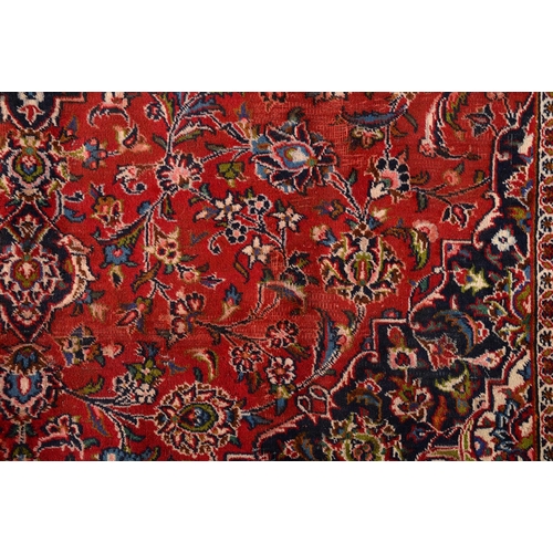 929 - A Persian carpet, 330 x 244cm