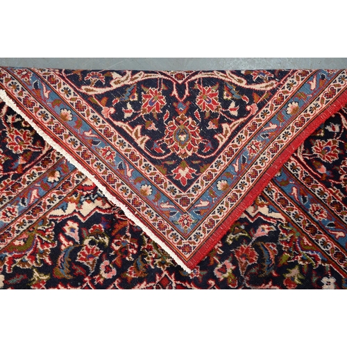 929 - A Persian carpet, 330 x 244cm