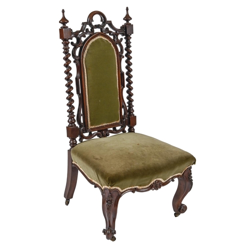 980 - A Victorian carved rosewood nursing chair, with carved, pierced and padded splat, flanked by spiral ... 