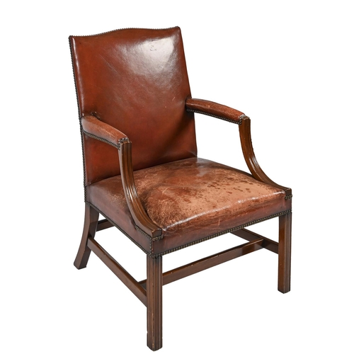 982 - A Victorian mahogany library chair, covered in red nail-back leather, seat height 43cm, overall widt... 