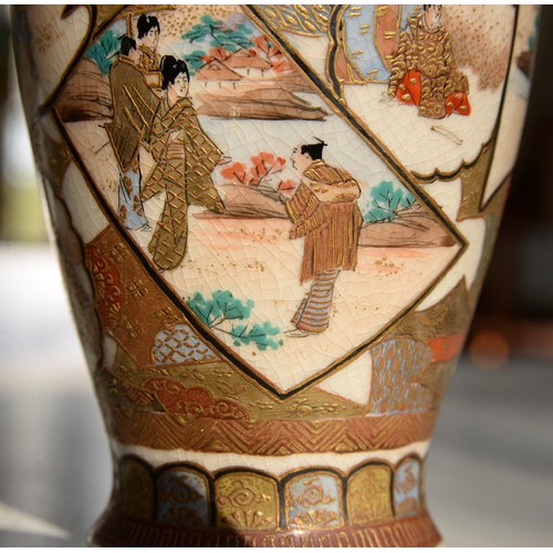 575 - A Japanese Satsuma vase, Meiji period, enamelled with overlapping figural panels of bijin and samura... 