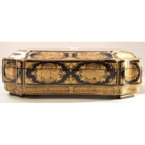 634 - A Chinese export black and gold lacquer games box, c1840, the interior fitted with seven boxes and c... 