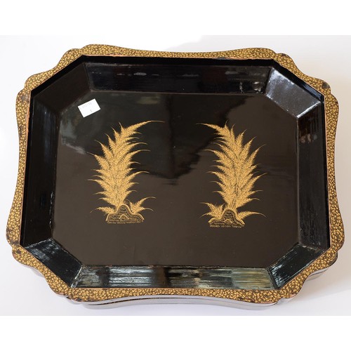 634 - A Chinese export black and gold lacquer games box, c1840, the interior fitted with seven boxes and c... 