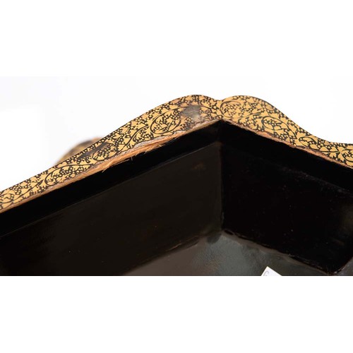 634 - A Chinese export black and gold lacquer games box, c1840, the interior fitted with seven boxes and c... 