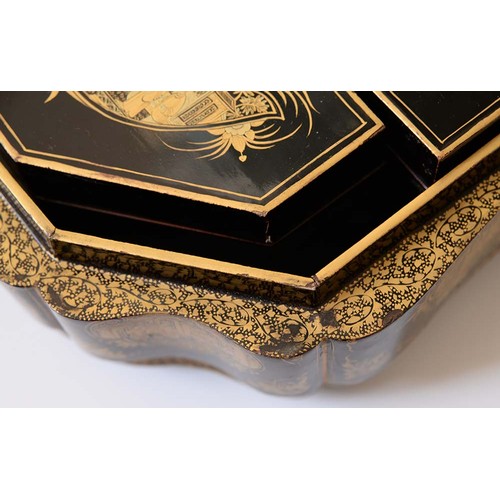 634 - A Chinese export black and gold lacquer games box, c1840, the interior fitted with seven boxes and c... 