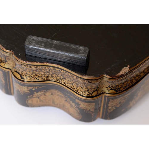 634 - A Chinese export black and gold lacquer games box, c1840, the interior fitted with seven boxes and c... 