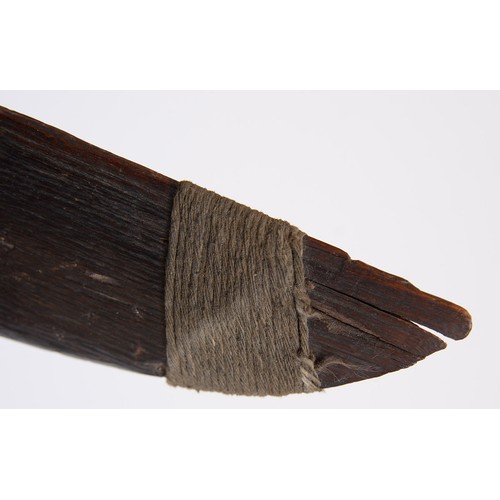 659 - An Australian Aboriginal boomerang, 19th c, bound at one end, 71cm l