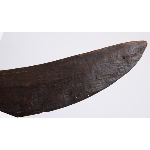 659 - An Australian Aboriginal boomerang, 19th c, bound at one end, 71cm l