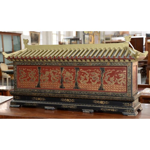 961 - A Chinese lacquered casket, early 20th c, with pagoda style cover, split interior and second compart... 