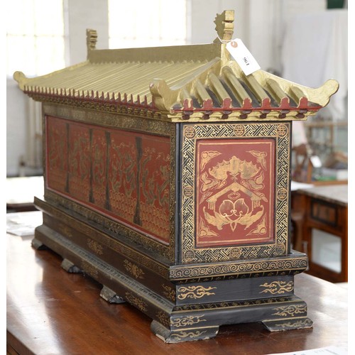 961 - A Chinese lacquered casket, early 20th c, with pagoda style cover, split interior and second compart... 